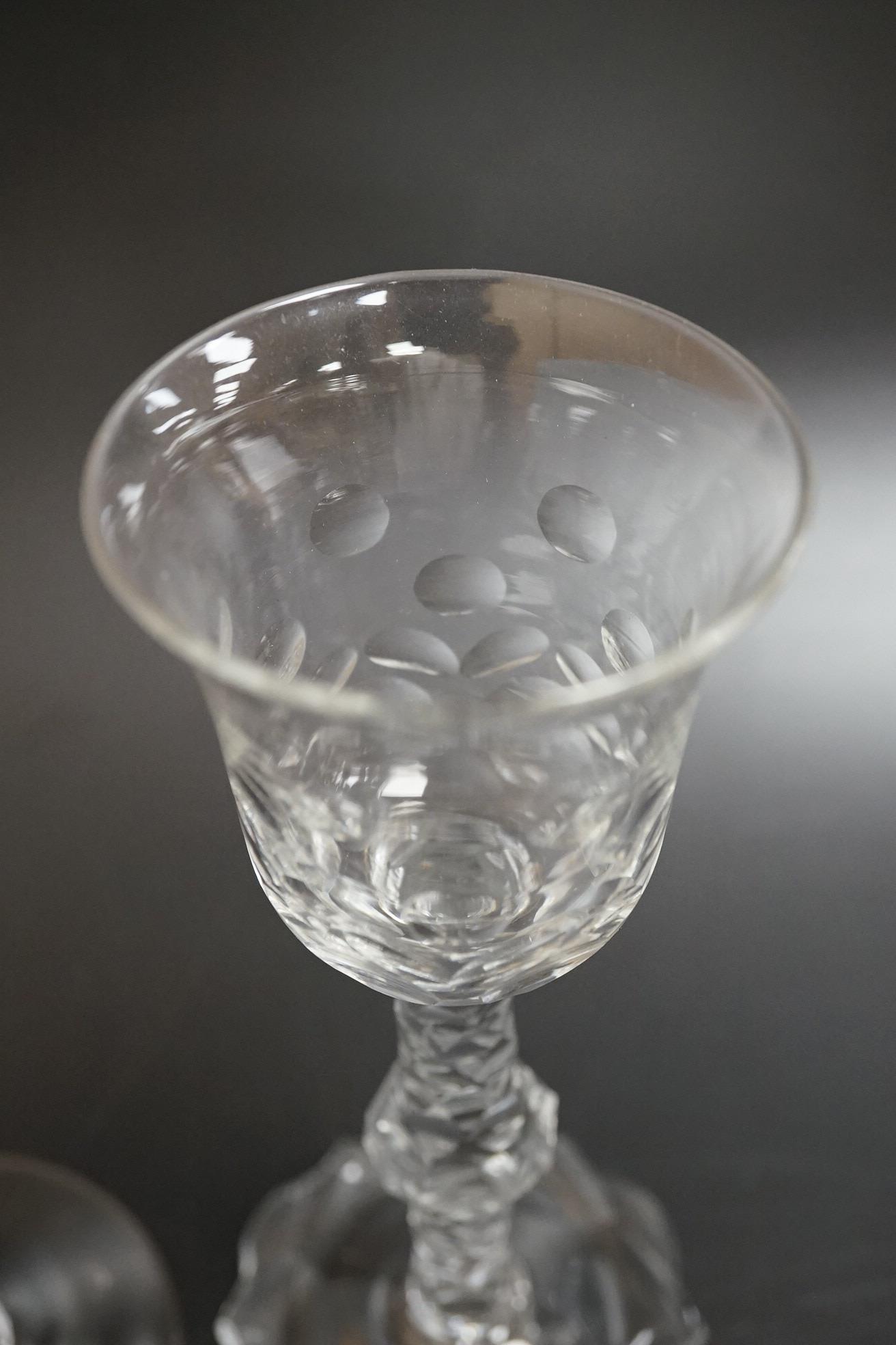 Two faceted wine glasses, c.1775, one with faceted star cut foot, tallest 15cm